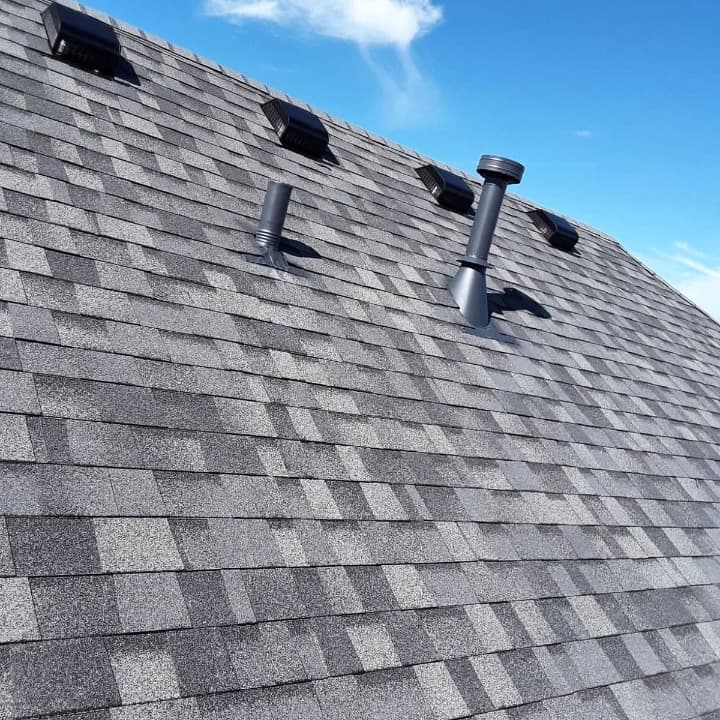 roofer installing shingles roofer installing shingles